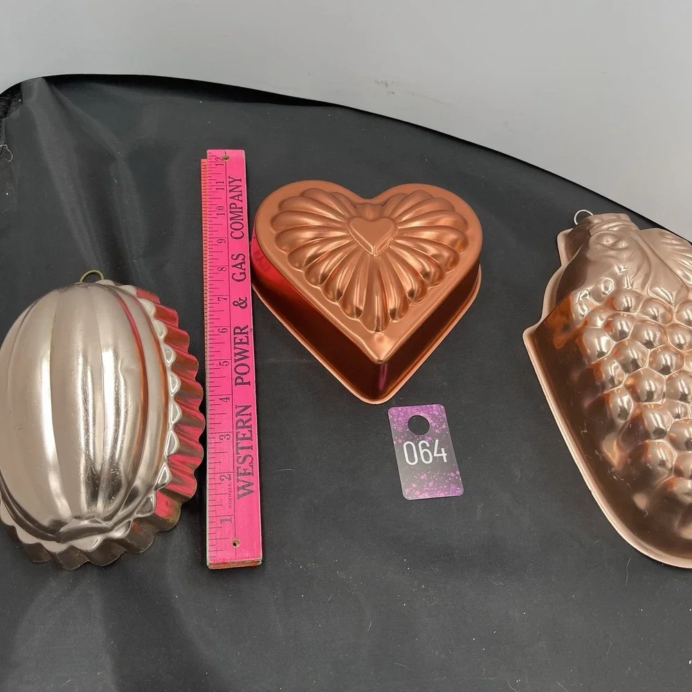 Three metal  Jell-O‎ wall hanging mold